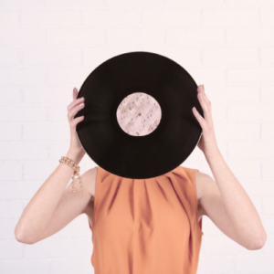 Woman holding vinyl record